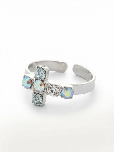 Carly Cross Band Ring - RGE1PDRQ - <p>A delicate cross motif rests lightly on the hand, built from six round-cut crystals that catch the light with subtle iridescence. The blend of clear, pale blue, and aurora borealis stones creates a soft, shifting color palette that changes as you move. Built with a flat metal band, the open design allows for an easily adjustable, comfortable fit. It is a quiet, personal piece that slips naturally into your daily ring stack or holds its own alone.</p><ul>
<li>Delicate cross motif built from individually set round-cut crystals</li>
<li>Soft iridescent color palette combining clear and pale blue tones</li>
<li>Adjustable ring band</li>
<li>Protective e-coat finish for lasting wear</li>
<li>Includes signature organza pouch for gifting and travel</li>
</ul>