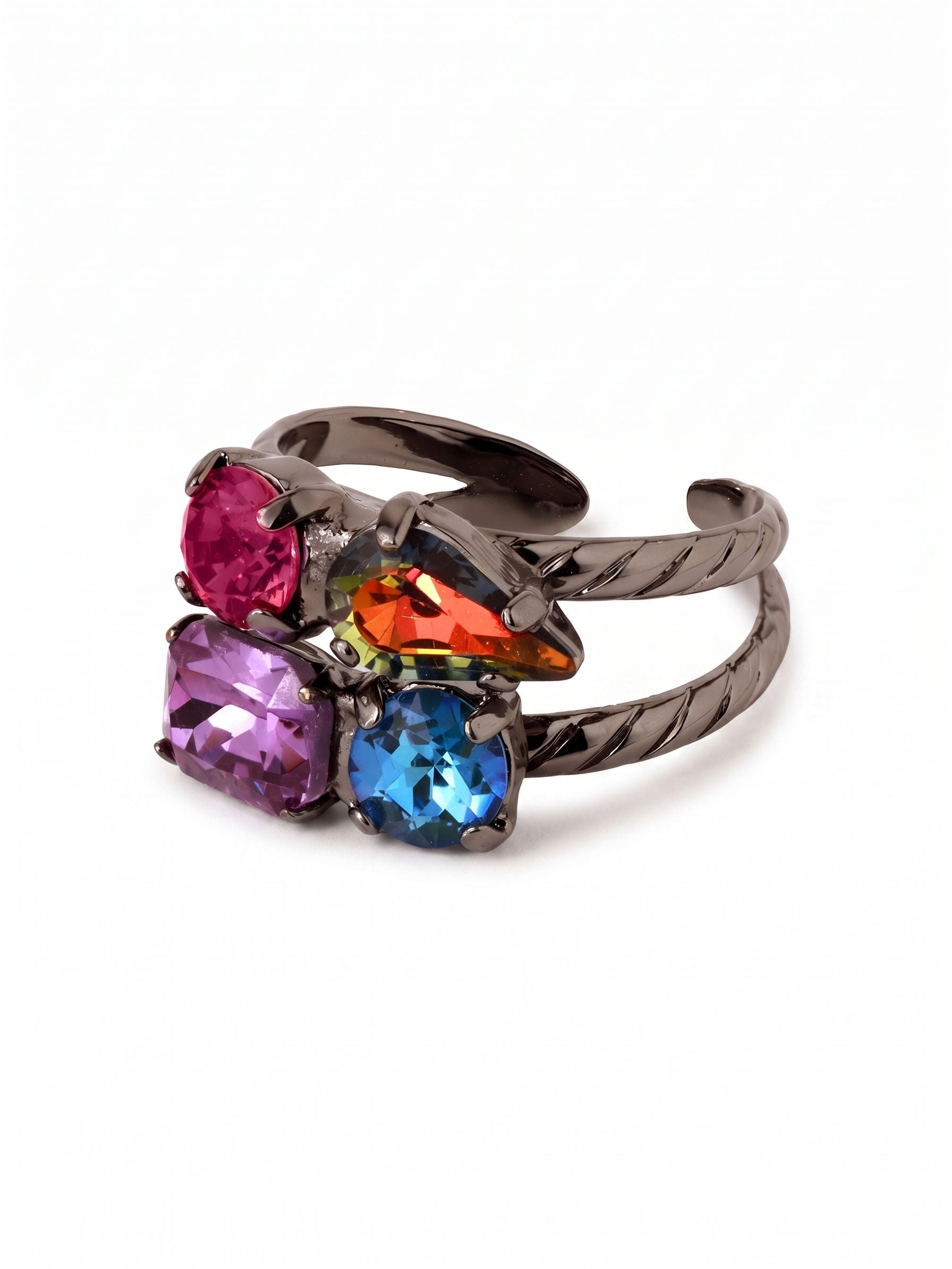 Moxie Adjustable Cocktail Ring - RGI3GMNNI - <p>Four distinct crystal cuts cluster organically, creating the illusion of a carefully curated stack in one easy piece. A dark metal finish anchors the vivid mix of fuchsia, fiery pear, and soft tanzanite tones, giving the bright stones a grounded edge. The twisted dual band is left open at the back, allowing you to gently customize the fit for comfort as your hands move through the day.</p><ul>
<li>Organic cluster of mixed round, pear, and emerald crystal cuts</li>
<li>Textured dual bands create an effortless stacked illusion</li>
<li>Adjustable ring band</li>
<li>Includes signature organza pouch for gifting and travel</li>
</ul>
