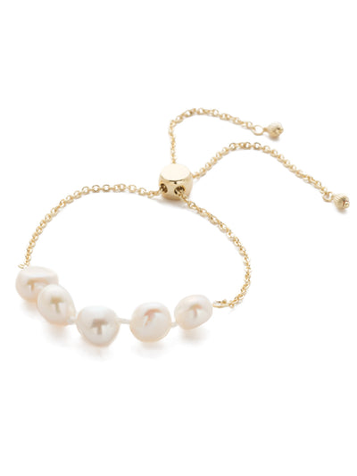Celeste Slider Bracelet - 4BEF2BGMDP - <p>A must-wear for any wrist, this adjustable classic features a delicate chain accented by freshwater pearls. From Sorrelli's Modern Pearl collection in our Bright Gold-tone finish.</p>