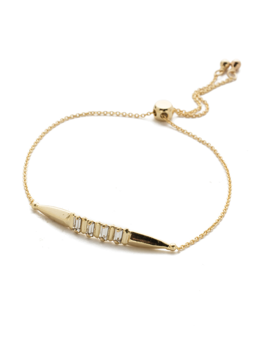 Halcyon Cursory Crystal Slider Bracelet - 4BEK28BGCRY - <p>Slip on some edge with this adjustable bracelet featuring a pointed metal statement piece and a foursome of beautiful baguette crystals. From Sorrelli's Crystal collection in our Bright Gold-tone finish.</p>