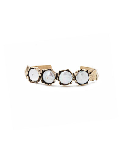 Diana Cuff Bracelet - 4BEU10AGMDP - <p>Edgy with pearls? That's our Diana Cuff Bracelet. Adjustable for just about any wrist, wear it when you're the mood for a twist on a classic. From Sorrelli's Modern Pearl collection in our Antique Gold-tone finish.</p>