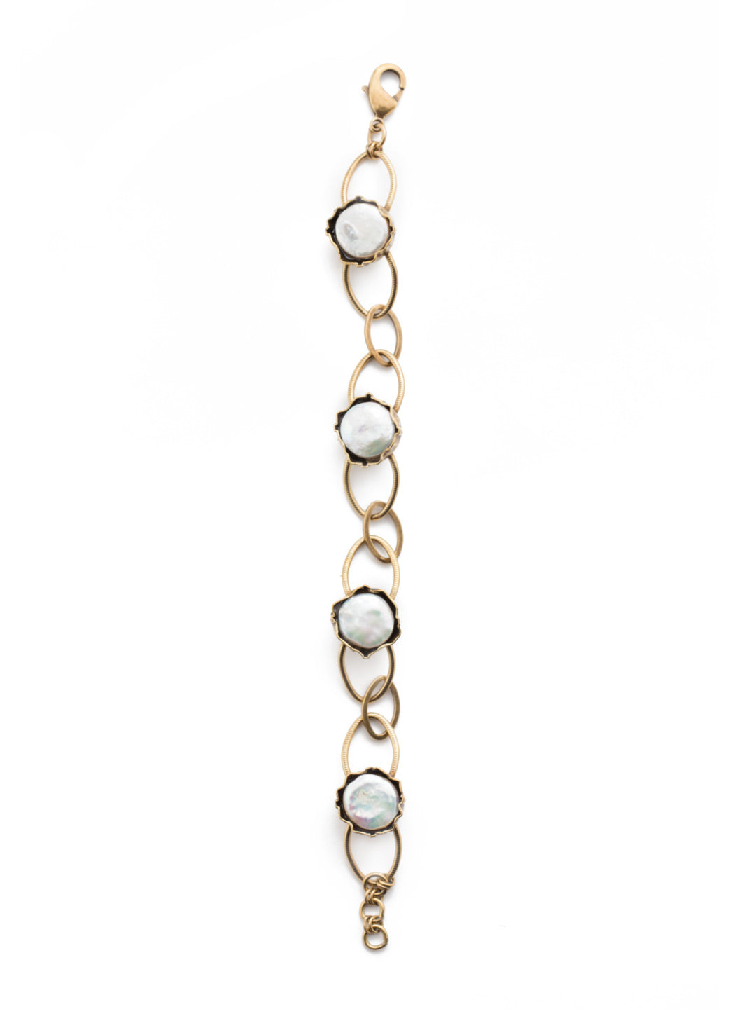 Nairobi Tennis Bracelet - 4BEU1AGMDP - <p>Fasten on our Nairobi Tennis Bracelet for loops of metal dotted with classic freshwater pearls framed in edgy metalwork. It's extra-special. From Sorrelli's Modern Pearl collection in our Antique Gold-tone finish.</p>