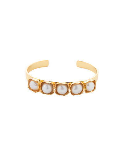 Margot Cuff Bracelet - 4BEV8BGMDP - <p>The Margot cuff bracelet gives a modern twist to the classic pearl; five freshwater pearls sit cushioned atop metal ruffles and an adjustable cuff. From Sorrelli's Modern Pearl collection in our Bright Gold-tone finish.</p>