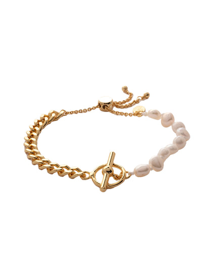 Beatrice Slider Bracelet - 4BFC1BGMDP - <p>The Beatrice Slider Bracelet features a half row of freshwater pearls connecting to a half row of chains. From Sorrelli's Modern Pearl collection in our Bright Gold-tone finish.</p>