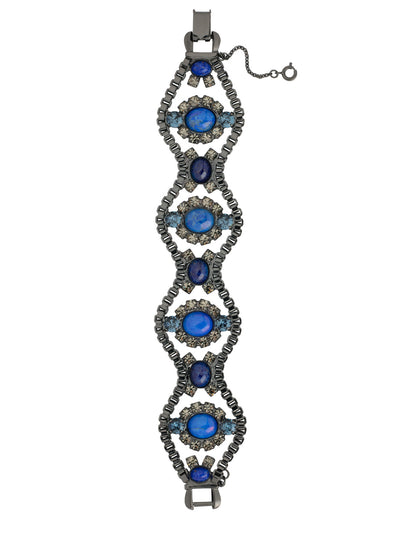 Lapis Statement Bracelet - 4BFL20GMIND - <p>The Lapis Statement Bracelet features detailed metalwork and semi-precious stones on a thick bracelet, secured with a clasp and additional safety chain. From Sorrelli's Industrial collection in our Gun Metal finish.</p>