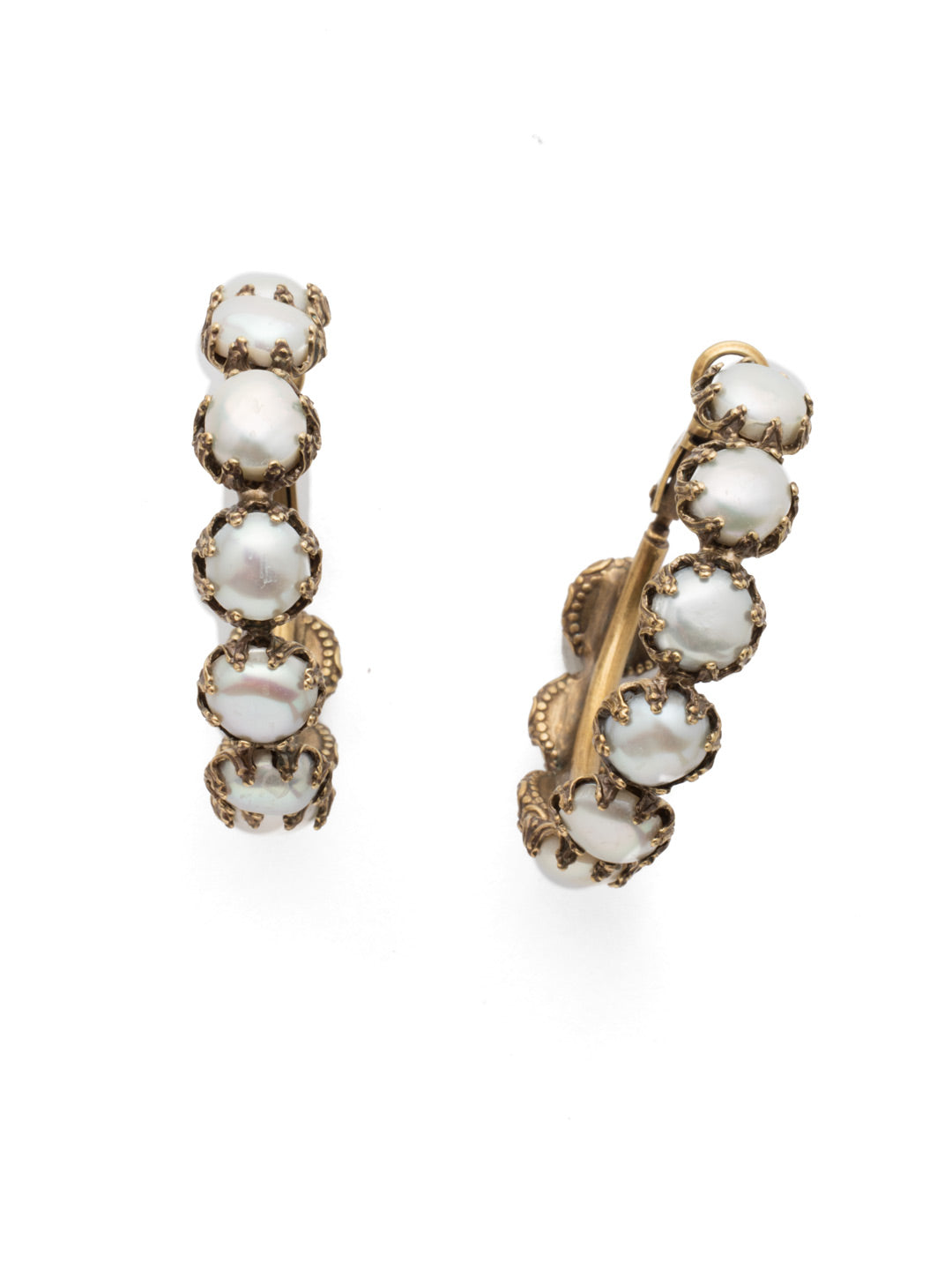 Alvina Hoop Earrings - 4EES2AGMDP - <p>Our Alvina Hoop Earrings are for pearl lovers looking for something fun and unique. The classic hoop style gets completely covered in pearls from start to finish, oozing sophistication. From Sorrelli's Modern Pearl collection in our Antique Gold-tone finish.</p>