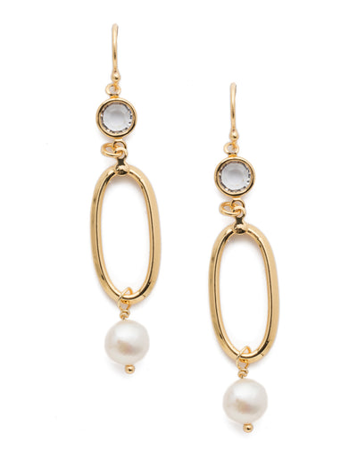 Melody Dangle Earring - 4EET5BGMDP - <p>Open, airy, and beautiful describe the Melody Dangle Earrings perfectly. A single metal oval sits base to a delicate crystal and modern freshwater pearl. From Sorrelli's Modern Pearl collection in our Bright Gold-tone finish.</p>