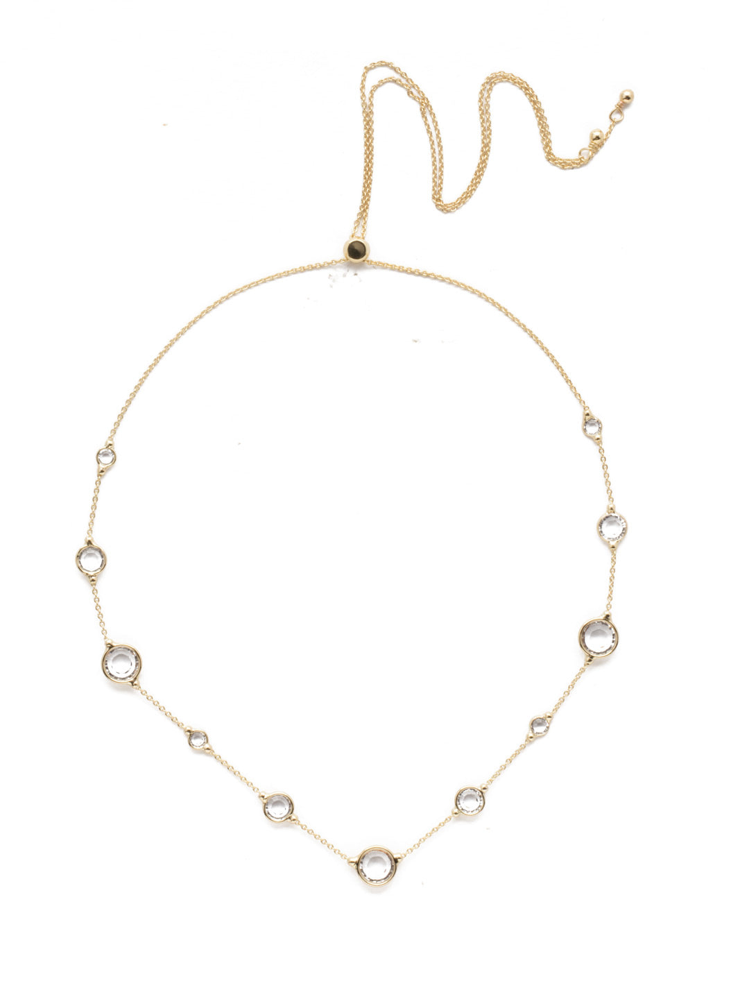 Inner Orbit Crystal Tennis Necklace - 4NEK34BGCRY - <p>Small, medium and large crystal gems get equal time and attention in this classic slider necklace you're sure to reach for again and again. From Sorrelli's Crystal collection in our Bright Gold-tone finish.</p>