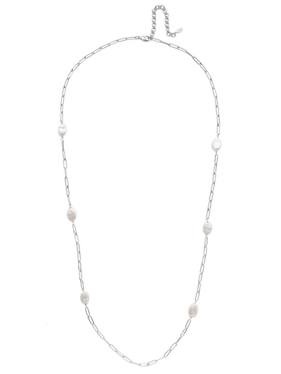 Cascade Long Necklace - 4NES6ASMDP - The Cascade Long Necklace features a delicate metal chain offset by a mirrorball-like pendant piece, reflecting light with its baquette and circular crystal sparklers. From Sorrelli's Modern Pearl collection in our Antique Silver-tone finish.