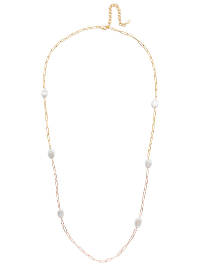 Cascade Long Necklace - 4NES6MXMDP - <p>The Cascade Long Necklace features a delicate metal chain offset by a mirrorball-like pendant piece, reflecting light with its baquette and circular crystal sparklers. From Sorrelli's Modern Pearl collection in our Mixed Metal finish.</p>