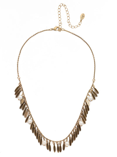 Twyla Tennis Necklace - 4NES8AGMDP - <p>Throw on some metallic fringe in our Twyla Tennis Necklace. This fun piece adds a touch of class with dots of pretty pearls. From Sorrelli's Modern Pearl collection in our Antique Gold-tone finish.</p>