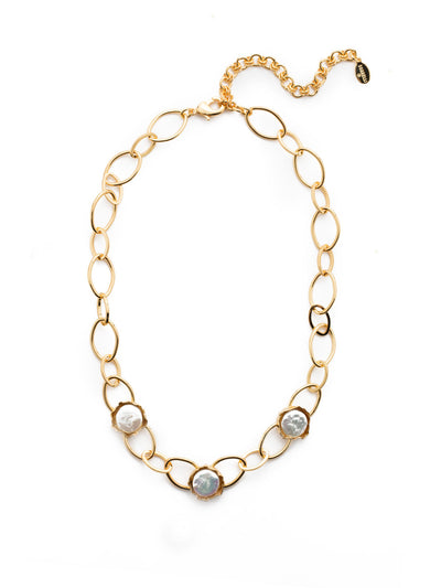 Nairobi Tennis Necklace - 4NEU1BGMDP - <p>The Nairobi Tennis Necklace features three freshwater pearls framed in edgy handcrafted metalwork. The perfect twist on a classic look. From Sorrelli's Modern Pearl collection in our Bright Gold-tone finish.</p>