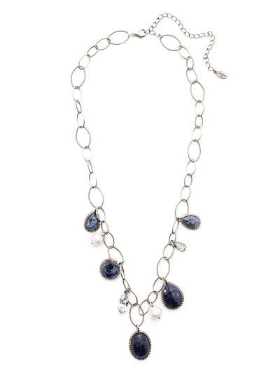 Chandler Long Necklace - 4NEU77ASIND - Love a charmed look? Layer on our Chandler Long Necklace for airy hoops giving way to bold stonework, classic pearls and a touch of crystal sparkle. From Sorrelli's Industrial collection in our Antique Silver-tone finish.