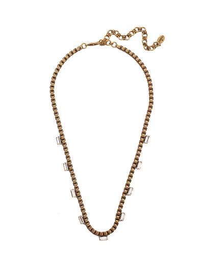 Cleo Classic Tennis Necklace - 4NEZ19AGCRY - <p>The Cleo Classic Tennis Necklace features a row of emerald cut crystals on a box chain. The lobster claw clasp secures the necklace at various lengths. From Sorrelli's Crystal collection in our Antique Gold-tone finish.</p>