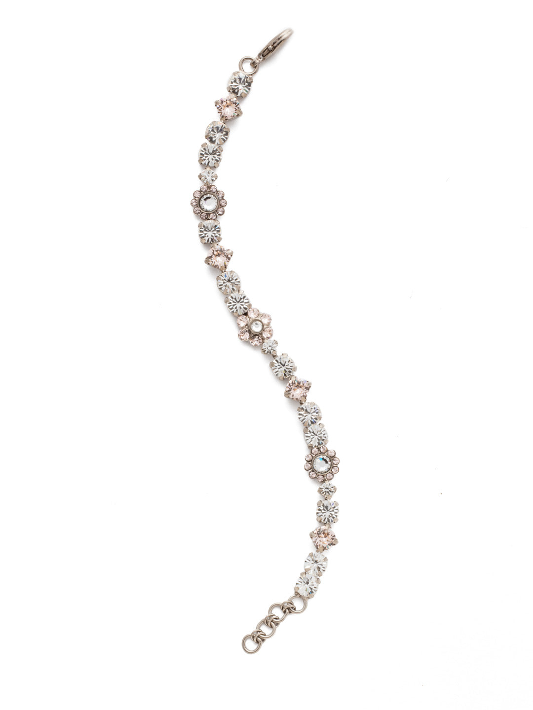 Classic Floral Tennis Bracelet - BBE2ASPLS - Blossoming beauty. This classic bracelet features a combination of round and floral cluster crystals to create the perfect amount of sweet sparkle.