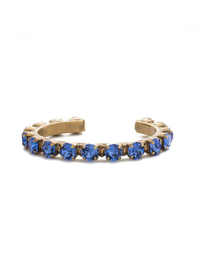 Riveting Romance Cuff Bracelet - BCL23AGSAP - <p>Truly antique-inspired, this piece can be mixed and matched in so many ways. Wear it with a vintage inspired outfit, or add a twist to a modern trend. This piece will match with everything! From Sorrelli's Sapphire collection in our Antique Gold-tone finish.</p>
