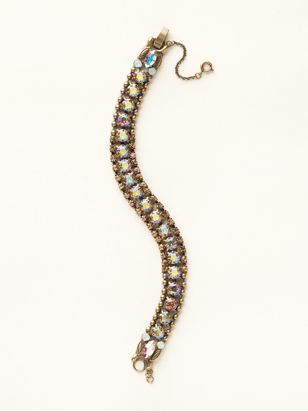 Right on Track Tennis Bracelet - BCN5AGAMA - <p>Who doesn't want a little extra dose of fabulous? Go ahead, indulge yourself! Three rows of crystals are sure to keep you sparkling and stunning no matter what your style. From Sorrelli's Amaretto collection in our Antique Gold-tone finish.</p>