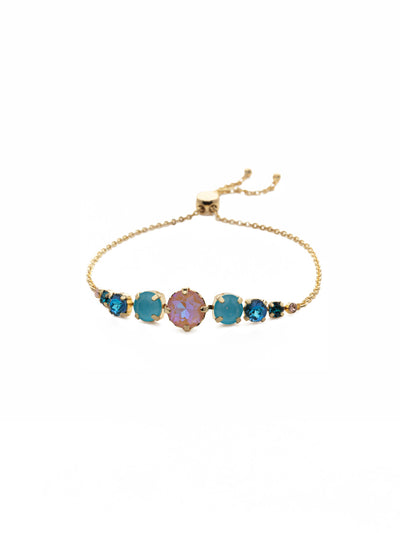 London Slider Bracelet - BCQ140BGSOP - <p>Slip on the London Slider Bracelet and adjust to your perfect fit. It's just the piece when you're looking to bling it on with some crystal sparkle. From Sorrelli's South Pacific collection in our Bright Gold-tone finish.</p>