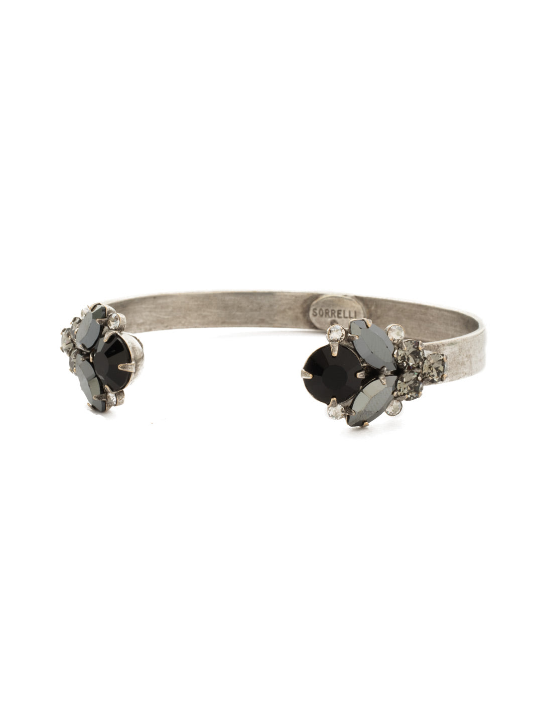 Crystal Cluster Cuff Bracelet - BCW17ASBON - Two crystal clusters adorn this open cuff bracelet to add well needed sparkle to any arm party! From Sorrelli's Black Onyx collection in our Antique Silver-tone finish.