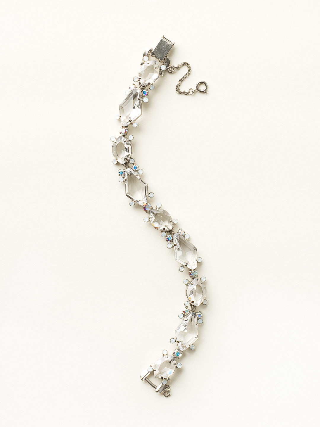 Pointed Pear and Diamond Cut Crystal Line Bracelet Classic Bracelet - BCZ1ASWBR - <p>A blushing beauty! This line bracelet features alternating pointed pear and diamond cut crystals. Accented by delicate stone clusters. From Sorrelli's White Bridal collection in our Antique Silver-tone finish.</p>