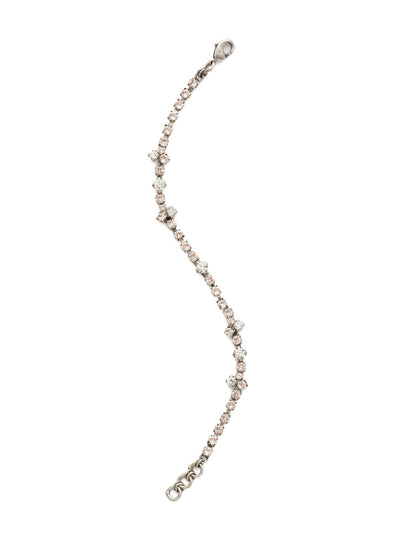 Delicate & Dazzling Line Tennis Bracelet - BDB79ASSNB - <p>This delicate tennis bracelet may be small in stature, but it's big on style! Petite round crystals are adorned with subtle crystal clusters, creating an understated elegance. From Sorrelli's Snow Bunny collection in our Antique Silver-tone finish.</p>