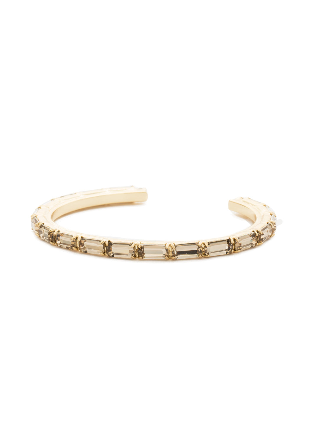 Brilliant Baguette Cuff Bracelet - BDK49BGDCH - <p>This cuff bracelet features repeating crystal baguettes and can be mixed and matched in a myriad of ways. From Sorrelli's Dark Champagne collection in our Bright Gold-tone finish.</p>