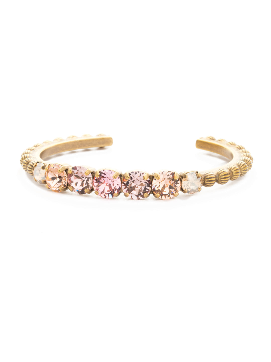 Mimosa Cuff Bracelet - BDQ24AGBCM - <p>A stylish cuff bracelet with far-away flare! Decorative ball chain accents this adjustable cuff featuring round and oval cut crystals. From Sorrelli's Beach Comber collection in our Antique Gold-tone finish.</p>