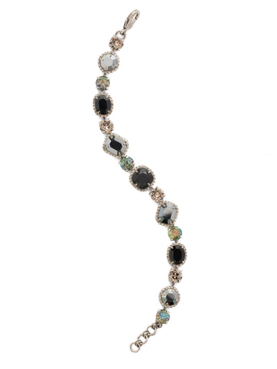 Dahlia Tennis Bracelet - BDQ38ASBON - A striking line bracelet with decorative edging that showcases cushion cut, oval, round and emerald cut crystals. From Sorrelli's Black Onyx collection in our Antique Silver-tone finish.