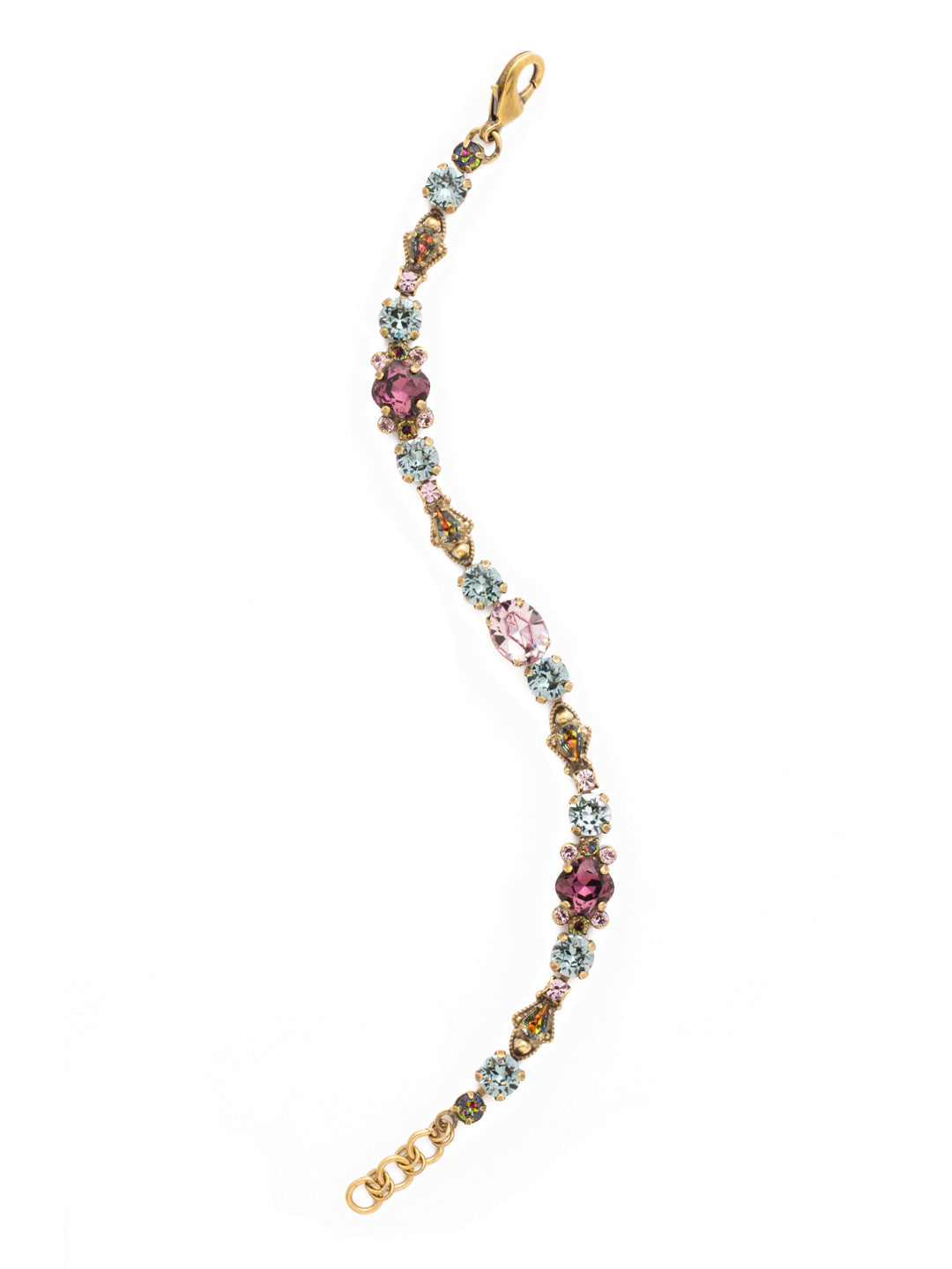 Mirabella Line Bracelet - BDS1AGROP - <p>A repeating pattern of mixed crystal colors and shapes featuring an oval cut crystal in the middle. The lobster clasp and extender chain make the bracelet easy to adjust to your desired length. This classic line bracelet is elegant and eclectic. It's a great stand alone piece or can be worn as a fashion statement, mixing it with other bracelets. From Sorrelli's Royal Plum collection in our Antique Gold-tone finish.</p>
