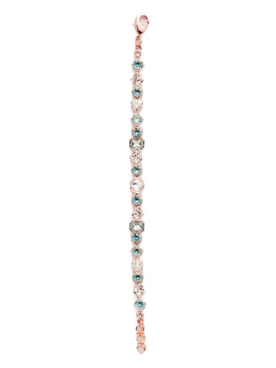 Sedge Tennis Bracelet - BDX1RGCAZ - This fully encrusted line bracelet features a variety of stones in square, round, cushion antique, triangle antique, and baguette shapes. From Sorrelli's Crystal Azure collection in our Rose Gold-tone finish.