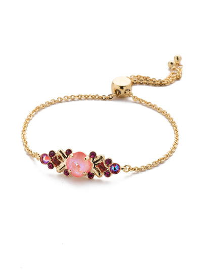 Rosina Slider Bracelet - BEA30BGBGA - Perfect for any occasion, our Rosina classic bracelet features a variety of different sized circular crystals nestled in a detailed center piece, with an adjustable chain completing this unique piece. From Sorrelli's Begonia collection in our Bright Gold-tone finish.