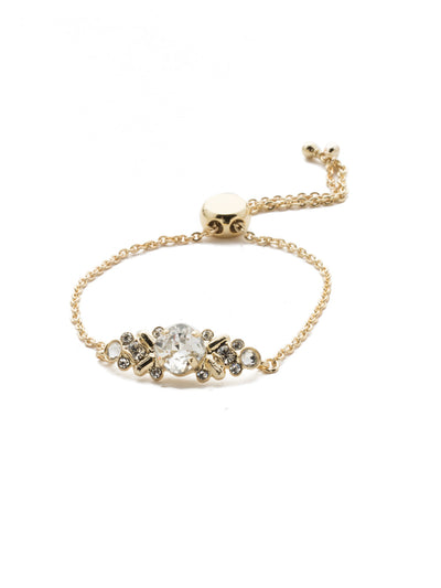 Rosina Slider Bracelet - BEA30BGCRY - Perfect for any occasion, our Rosina classic bracelet features a variety of different sized circular crystals nestled in a detailed center piece, with an adjustable chain completing this unique piece. From Sorrelli's Crystal collection in our Bright Gold-tone finish.