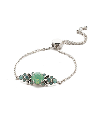 Rosina Slider Bracelet - BEA30RHPAC - <p>Perfect for any occasion, our Rosina classic bracelet features a variety of different sized circular crystals nestled in a detailed center piece, with an adjustable chain completing this unique piece. From Sorrelli's Pacific Opal collection in our Palladium Silver-tone finish.</p>