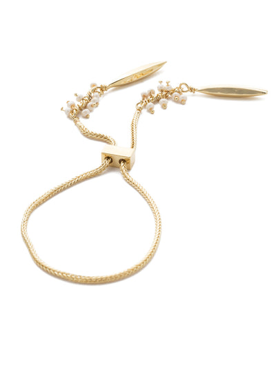 Adela Slider Bracelet - BEB49BGMDP - <p>This stylish slider bracelet features a delicate rope chain accented by delicate pearl embellishments and pointed metal charms on the ends. Just like our other slider bracelets, the Adela Slider adjusts to comfortably fit your wrist. From Sorrelli's Modern Pearl collection in our Bright Gold-tone finish.</p>