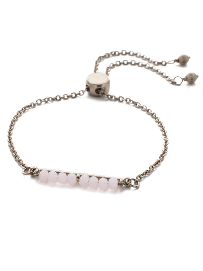 Elena Slider Bracelet Slider Bracelet - BEC12ASMP - <p>Dainty and elegant! This slider bracelet features a row of petite pearl beads at its center and is all held together by an adjustable delicate chain. From Sorrelli's Misty Pink collection in our Antique Silver-tone finish.</p>