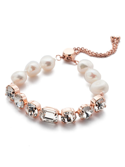 Cadenza Slider Bracelet - BEC14RGCRY - <p>A classic line bracelet reimagined with a adjustable slider clasp. A pattern of crystals and pearls give this bracelet all around allure. From Sorrelli's Crystal collection in our Rose Gold-tone finish.</p>