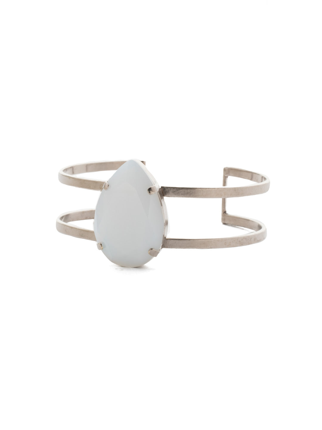 Ellaria Cuff Bracelet - BEF1ASSNM - This bracelet is adorned with a marbled stone cast in the middle of an iron cuff. This can be a perfect piece to go along with any daytime outfit and is a slip-on style. From Sorrelli's Snowy Moss collection in our Antique Silver-tone finish.