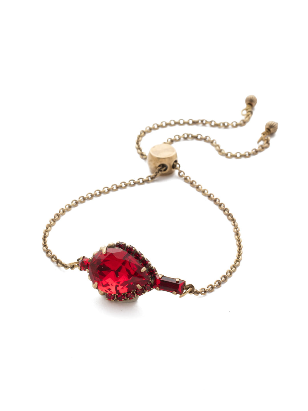 Lysa Slider Bracelet - BEF2AGSNR - A pear shaped crystal jewel is linked between two smaller crystals on a delicate chain that can be easily adjusted to create your own ideal fit. From Sorrelli's Sansa Red collection in our Antique Gold-tone finish.