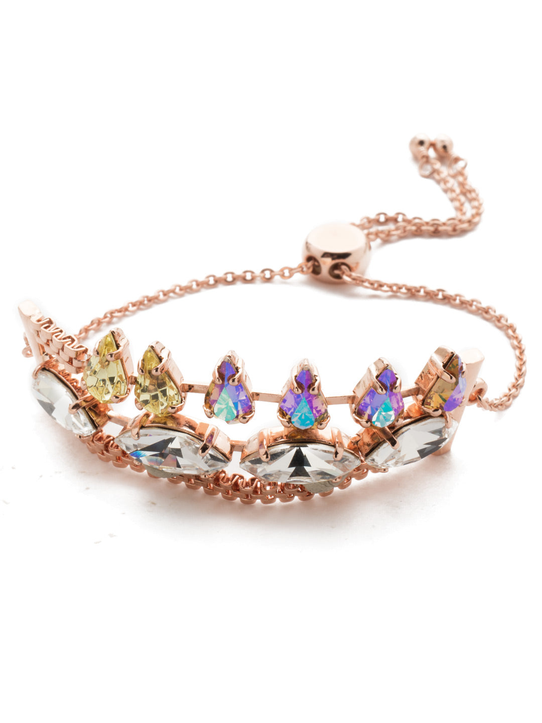 Arya Slider Bracelet - BEF6RGROG - <p>A mesmerizing glimmer of stacked marquise and teardrop crystals atop a weightless metal band dainty in appearance. This piece is sure to be the center of attention at any party and can be easily adjusted to create your own ideal fit. From Sorrelli's Rose Garden  collection in our Rose Gold-tone finish.</p>