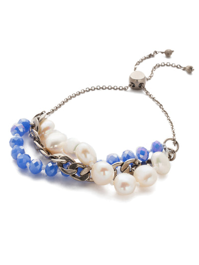 Catelyn Slider Bracelet - BEF9ASGLC - <p>This slider bracelet is layered with dainty pearls and beads ending with a weightless metal chain. It is completely adjustable for your perfect fit and is a brilliant shimmering accent piece in any layered bracelet ensemble. From Sorrelli's Glacier collection in our Antique Silver-tone finish.</p>