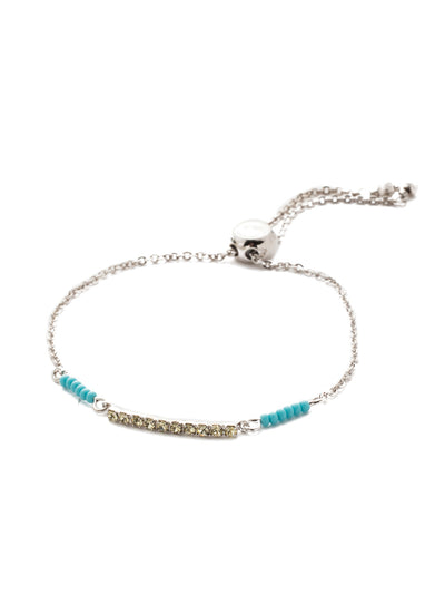 Bilss Slider Bracelet - BEH21RHTHT - Slide on this adjustable beauty featuring a row of crystal gems accented by beadwork on each side. Slider bracelet closure. From Sorrelli's Tahitian Treat collection in our Palladium Silver-tone finish.