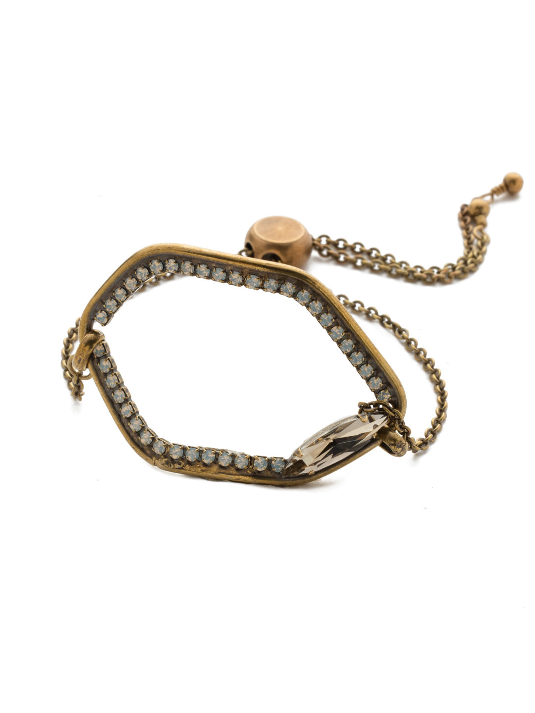 Demetria Slider Bracelet - BEH28AGROB - <p>Don't be shy. Slide on this classic bracelet stunner and make a statement. Its unique shape completely lined in crystals and accented with a navette stone demands to be noticed. Slider bracelet closure. From Sorrelli's Rocky Beach collection in our Antique Gold-tone finish.</p>