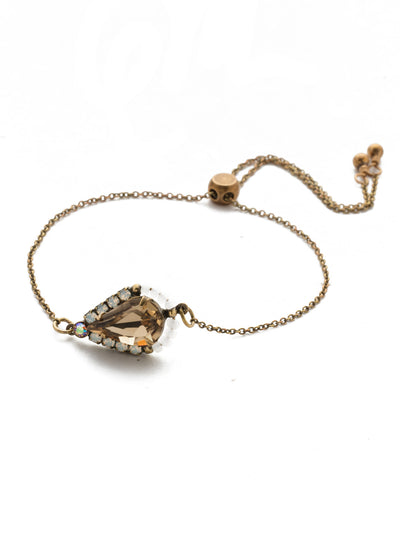 Delicate Drop Slider Bracelet - BEK15AGROB - <p>Slip on this adjustable beauty: the perfect pear center stone shines bright - and you will, too. Slider bracelet closure. From Sorrelli's Rocky Beach collection in our Antique Gold-tone finish.</p>