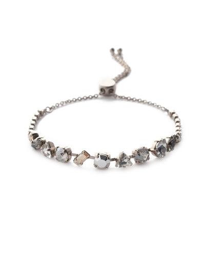 Cherished Slider Bracelet - BEK19ASGNS - <p>One shape doesn't have to fit all. Go for versatility with crystals of all kinds in a slider you can match to any outfit. Slider bracelet closure. From Sorrelli's Golden Shadow collection in our Antique Silver-tone finish.</p>