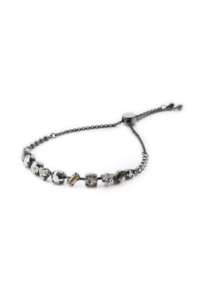 Cherished Slider Bracelet - BEK19GMGNS - One shape doesn't have to fit all. Go for versatility with crystals of all kinds in a slider you can match to any outfit. Slider bracelet closure. From Sorrelli's Golden Shadow collection in our Gun Metal finish.