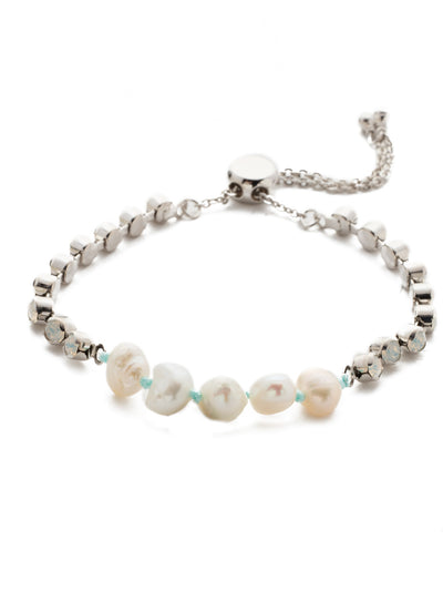 Pride & Joy Slider Bracelet - BEK5RHSSU - <p>You don't have to choose - you can have gorgeous crystal stones and a row of freshwater pearls in one piece with this adjustable slider bracelet that's easy to slip on and go. Slider bracelet closure. From Sorrelli's Seersucker collection in our Palladium Silver-tone finish.</p>