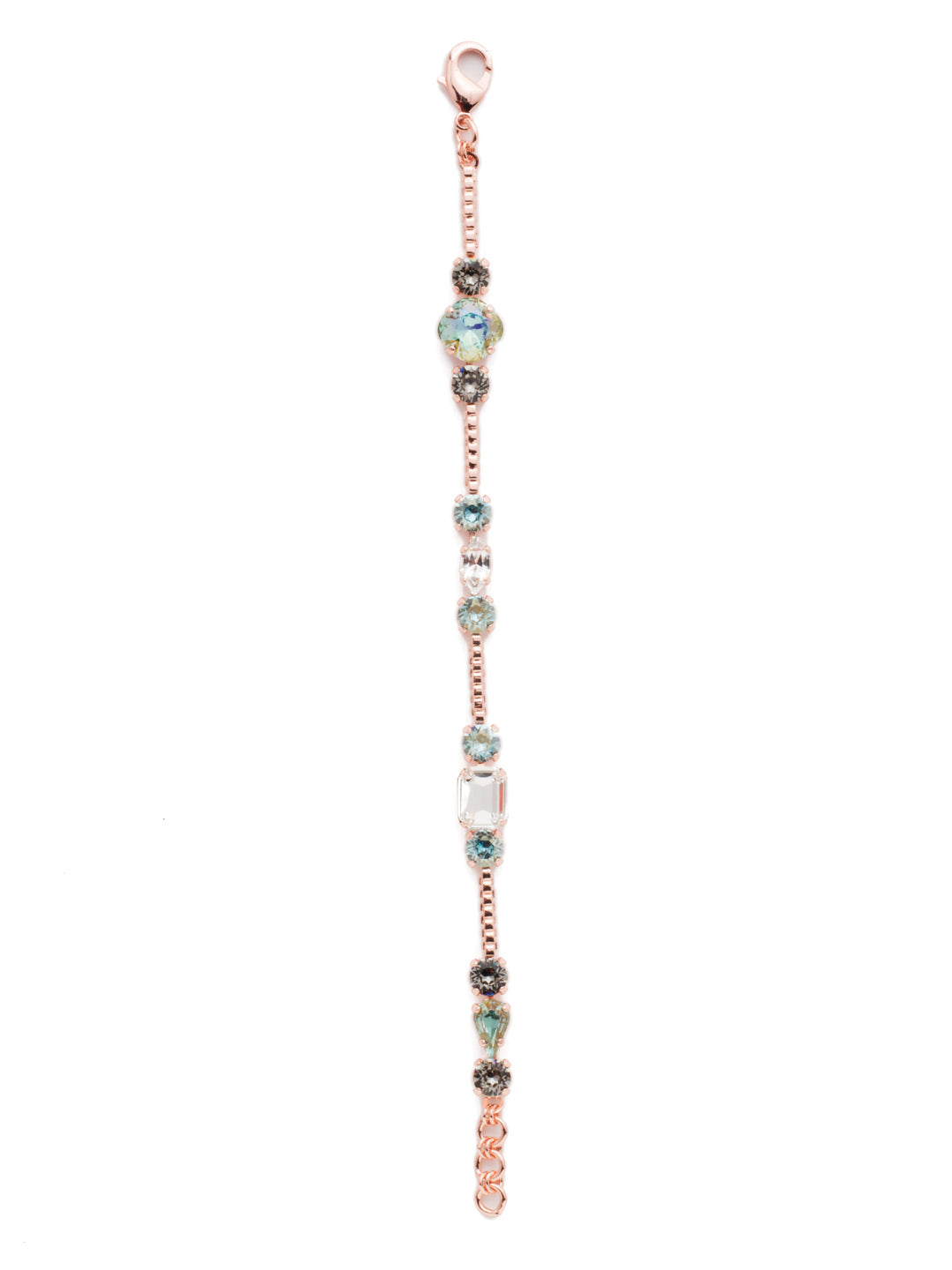 Natalie Tennis Bracelet - BEN18RGCAZ - The Natalie Tennis Bracelet is sophisticated glam wrapped around your wrist. The delicate metal base showcases elegant baquette-shaped stones and other crystal adornments that prove simplicity is stylish. From Sorrelli's Crystal Azure collection in our Rose Gold-tone finish.