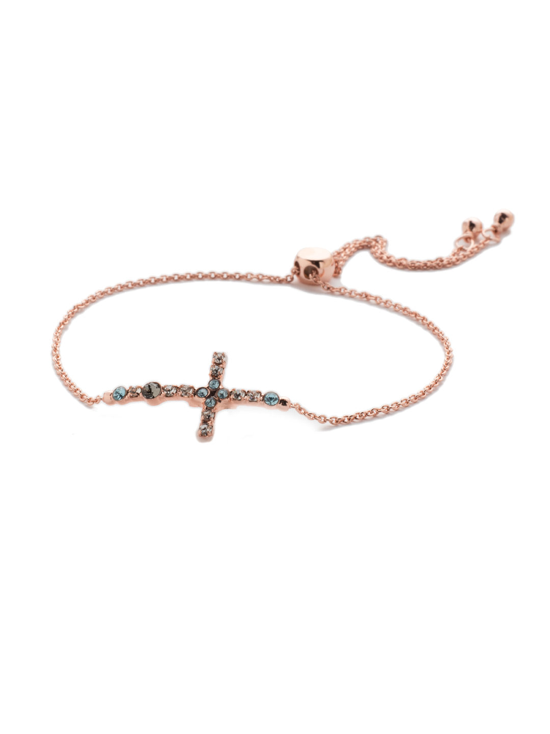 Giovanna Slider Bracelet - BEN1RGCAZ - The Giovanna Slider Bracelet features the crystal-encrusted cross fans are looking to slip on. Just adjust to your wrist size and you're set. From Sorrelli's Crystal Azure collection in our Rose Gold-tone finish.