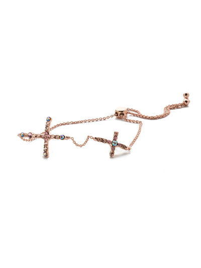 Adrienna Slider Bracelet - BEN2RGLVP - <p>The Adrienna Slider bracelet is a must-have piece for the cross lover, showcasing two encrusted in sparking crystals and adjusting to any wrist size. From Sorrelli's Lavender Peach collection in our Rose Gold-tone finish.</p>