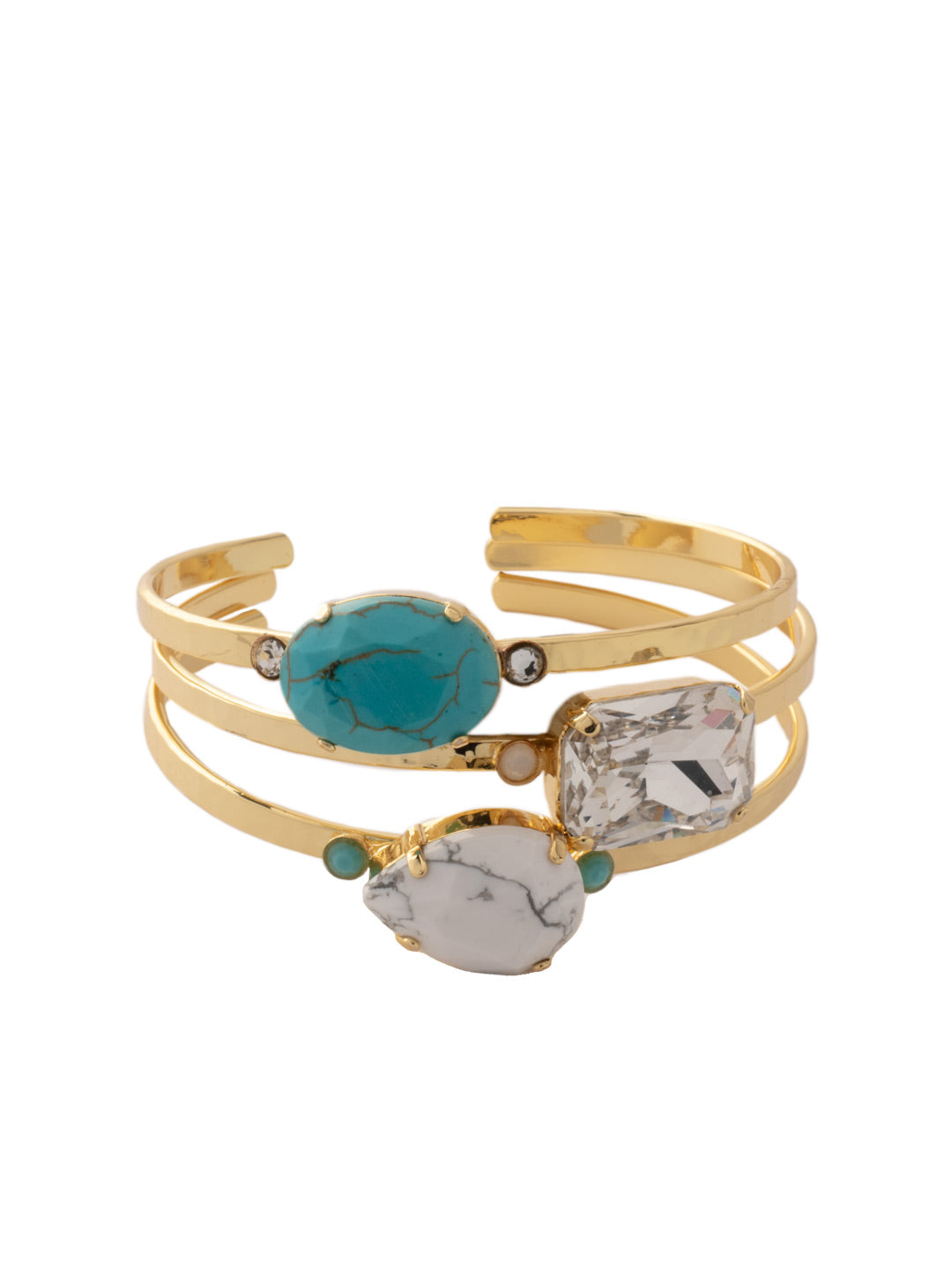 Leslie Cuff Bracelet - BEP18BGSTO - <p>Make a statement with the Leslie Cuff Bracelet. Tonal sparkling crystal in pear, oval and cushion octagon shapes showcase a variety of shades on a shining three-tier metal band. From Sorrelli's Santorini collection in our Bright Gold-tone finish.</p>